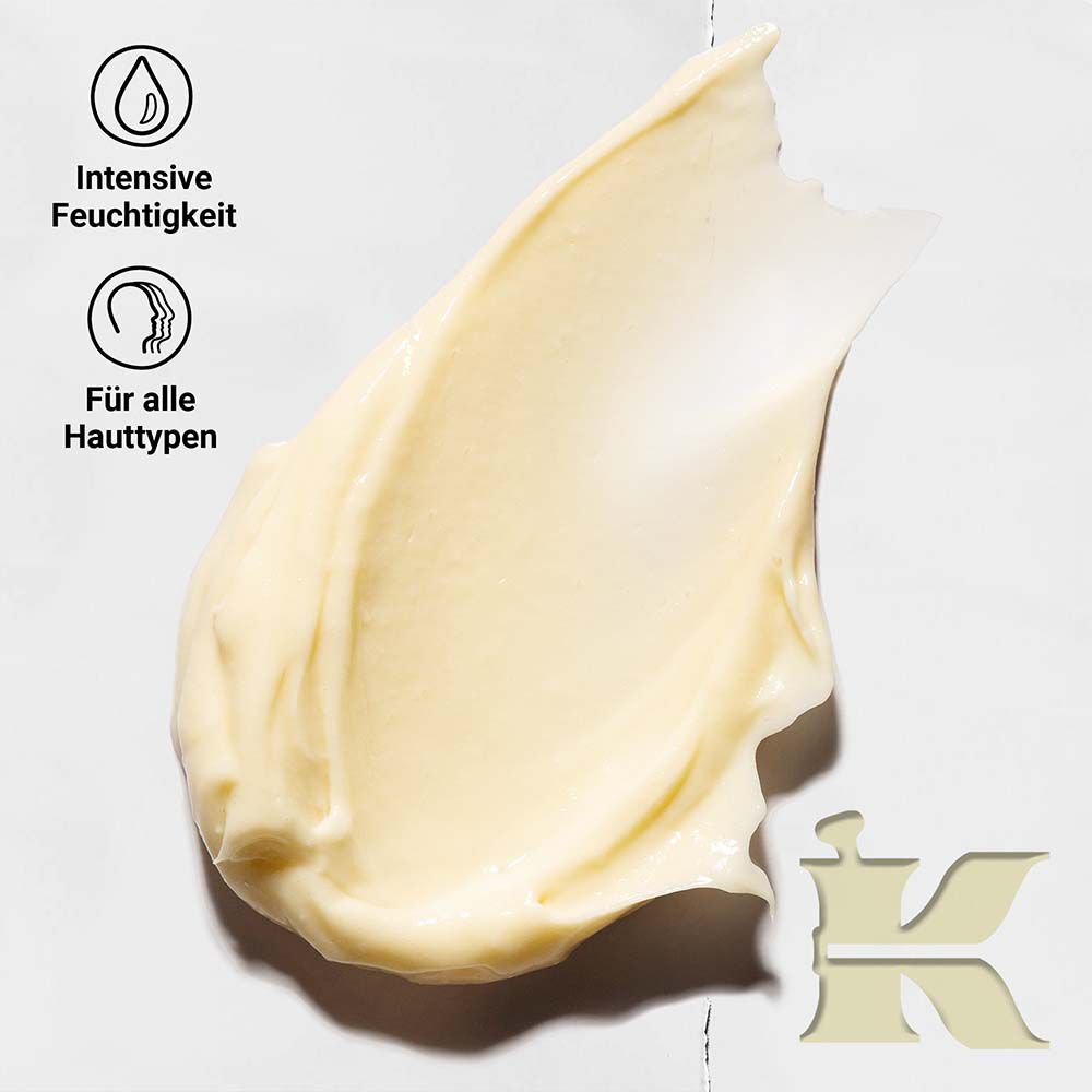 Texturfoto der Creme de Corps mit Symbolen, die bestatigen, dass sie Feuchtigkeit spendet und fur alle Hauttypen geeignet ist