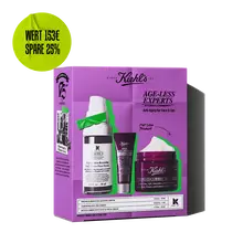 Kiehl's "Age-Less Experts" anti-aging skincare set, featuring a retinol serum, eye cream, and multi-corrective cream.