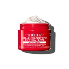 Roter Tiegel der Kiehl’s Ultra Facial Meltdown Recovery Cream Whip mit einer aufgeschlagenen Cremetextur.