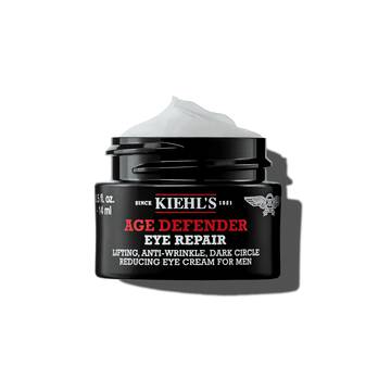 Ein 14-ml-Tiegel Kiehl's Age Defender Eye Repair mit aufgeschlagener Textur vor weißem Hintergrund.